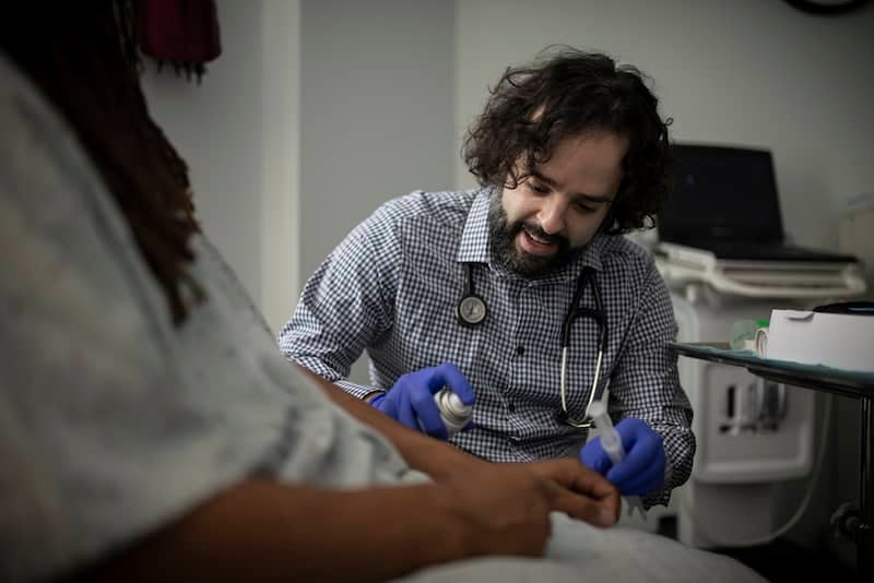 A provider meets with a patient